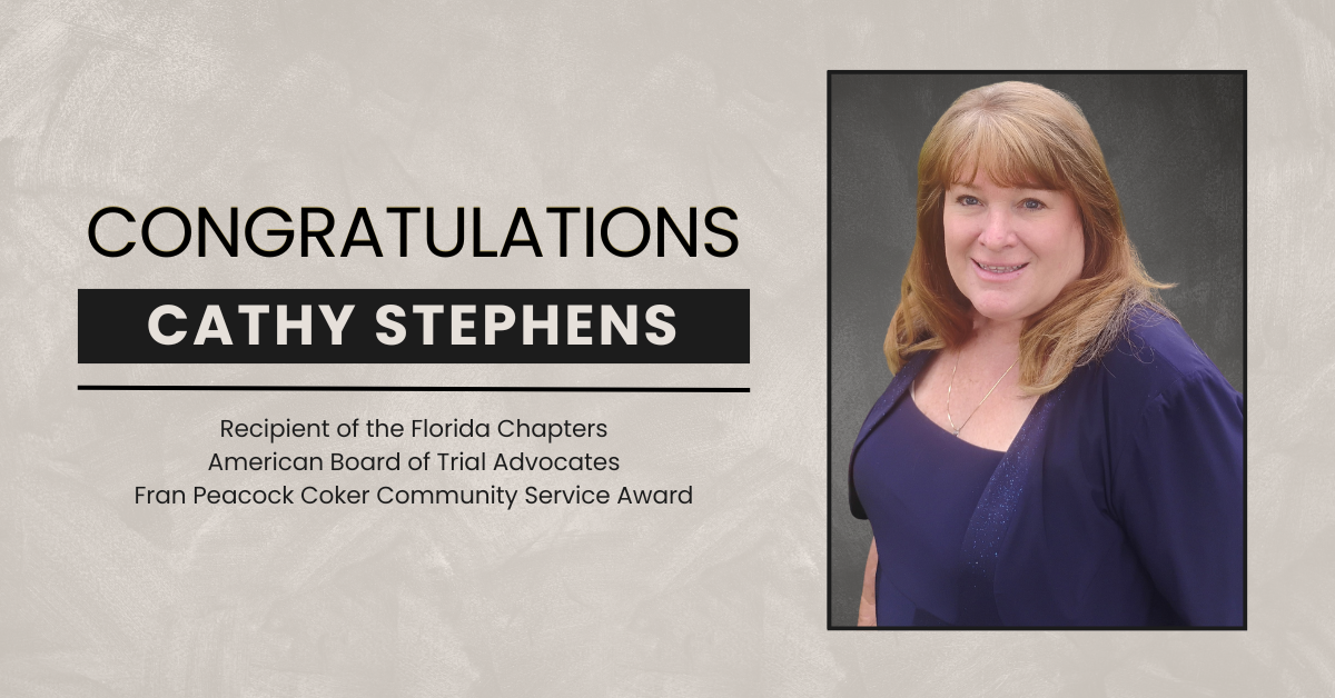 Photo of JA Cathy Stephens announcing that the Florida Chapters of ABOTA have named her the recipient of the Fran Peacock Coker Community Service Award.